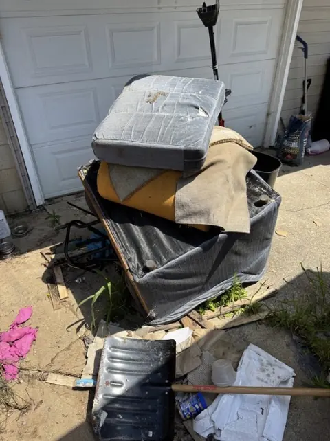Example: a whole pile in one shot, in front of a garage.